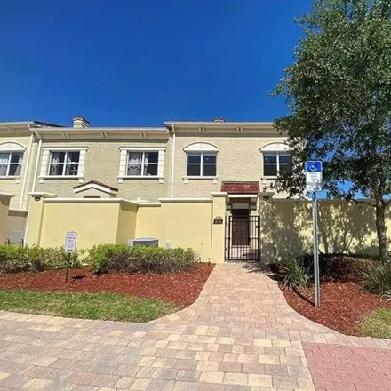 Rent this 4 bed townhouse on Terra del Sol Boulevard in Polk County, FL 33897