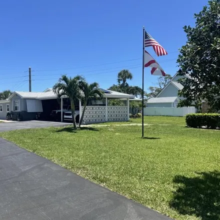 Buy this 4 bed house on 7126 Thompson Road in Palm Beach County, FL 33426