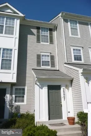 Rent this 3 bed townhouse on 19980 Gateshead Circle in Kings Square, Montgomery Village