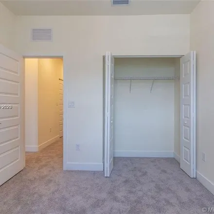 Rent this 3 bed apartment on 15818 Northwest 91st Avenue in Miami Lakes, FL 33018