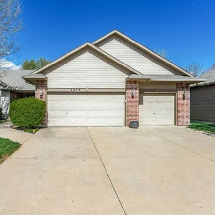 Buy this 4 bed house on 3252 North Forest Lakes Street in Wichita, KS 67205