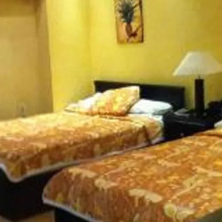 Rent this 3 bed apartment on Pizza Hut in 202 Al Haram Street, Kom al Akhdar