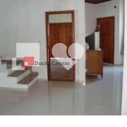 Buy this 4 bed house on Rua Aristides Gonçalves in Harmonia, Canoas - RS
