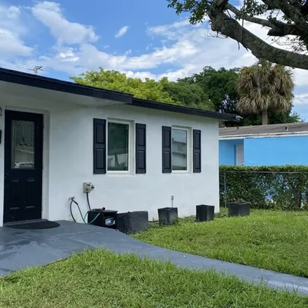 Rent this 3 bed house on 1353 S 9th St in West Palm Beach, Florida