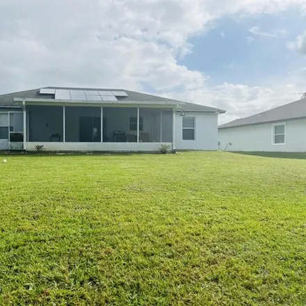 Buy this 3 bed house on 2156 Southwest Venus Street in Port Saint Lucie, FL 34953