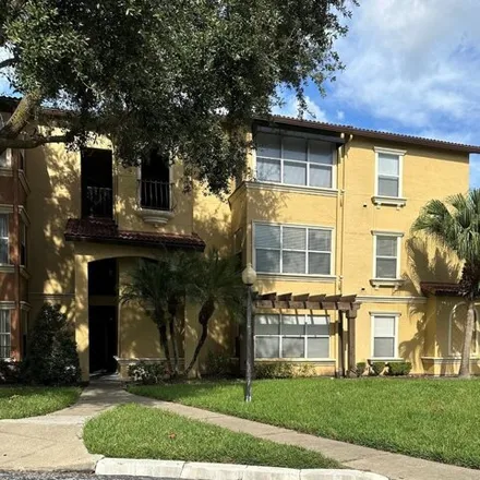 Rent this 2 bed condo on Shingle Creek Trail in Orlando, FL 32811