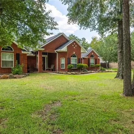 Buy this 3 bed house on 5926 Lotus Lane in Montgomery County, TX 77354