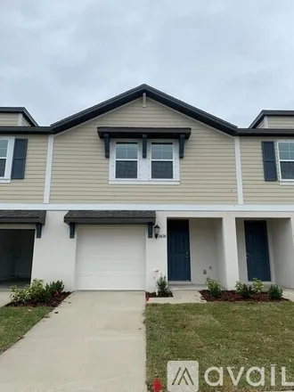 Rent this 3 bed townhouse on 5828 Ocean Isle Dr