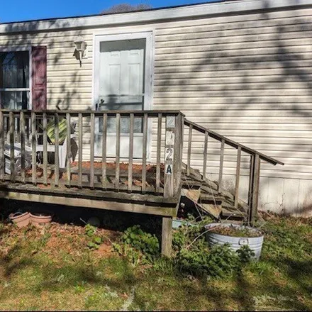 Buy this studio apartment on 206 Long Highway in Little Compton, RI 02837