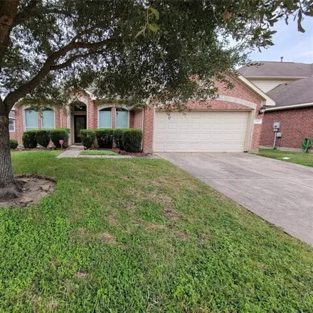 Rent this 4 bed house on 1532 Chandler Park Lane in Fresno, TX 77545