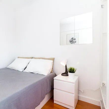 Rent this 4 bed room on Avenida Paulo VI in Rua Sousa Bastos, 1950-230 Lisbon
