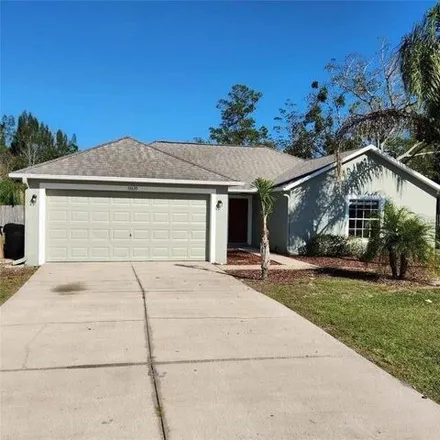 Rent this 3 bed house on 11635 Fairmont Ave in Leesburg, Florida