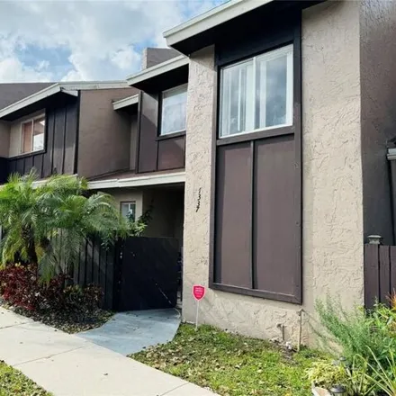 Buy this 2 bed townhouse on 7798 Tam Oshanter Boulevard in North Lauderdale, FL 33068