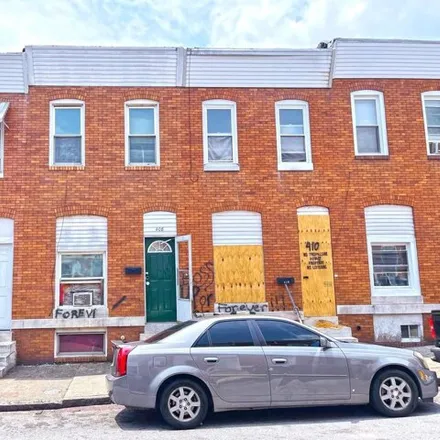 Buy this 2 bed townhouse on 408 N Curley St in Baltimore, Maryland