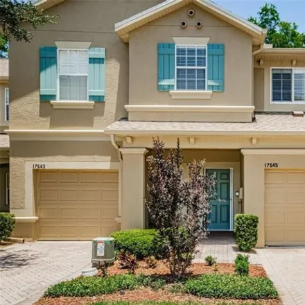 Buy this 4 bed townhouse on 17545 Hugh Ln in Land O Lakes, Florida