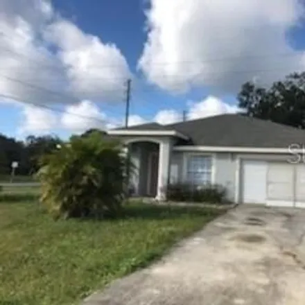 Rent this 3 bed house on 602 Bobcat Ln in Poinciana, Florida