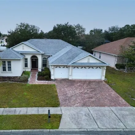 Buy this 4 bed house on 5557 Thorngrove Way in Spring Hill, FL 34609