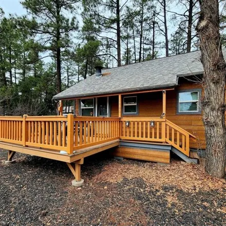 Buy this 1 bed house on 1488 Larson Road in Lake of the Woods, Navajo County