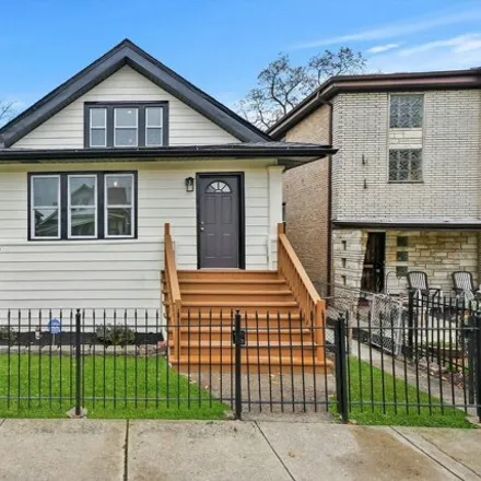 Buy this 4 bed house on 1215 North Menard Avenue in Chicago, IL 60651