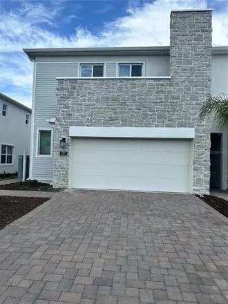Rent this 3 bed townhouse on Bogey Drive in Four Corners, FL 33897