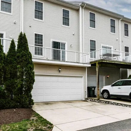 Rent this 3 bed townhouse on 42838 Sykes Terrace in South Riding, VA 20152