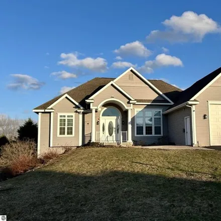 Buy this 5 bed house on 4123 Hidden Creek Drive in Garfield Township, MI 49684