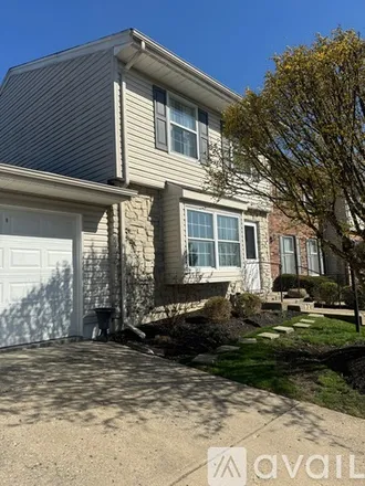 Rent this 2 bed townhouse on 454 Rolling Meadows Drive