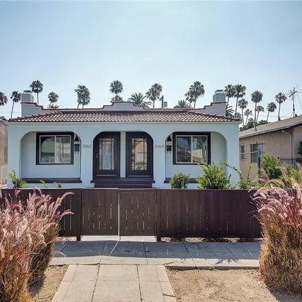 Buy this 4 bed duplex on 5162 Ruthelen Street in Los Angeles, CA 90062