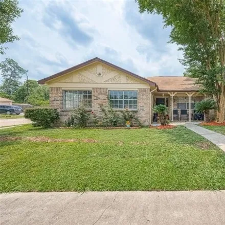 Buy this 4 bed house on 7100 Windy Point Drive in Harris County, TX 77379
