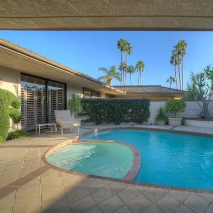 Rent this 4 bed house on The Springs Country Club in 1 Duke Drive, Rancho Mirage