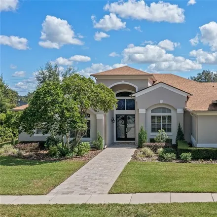 Buy this 4 bed house on 913 Golf Valley Drive in Orange County, FL 32712