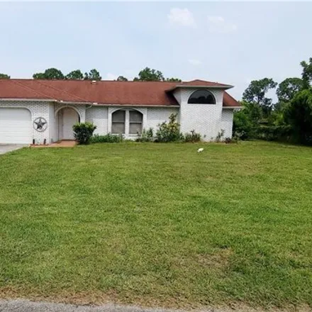 Buy this 4 bed house on 418 Roosevelt Avenue in Lehigh Acres, FL 33936
