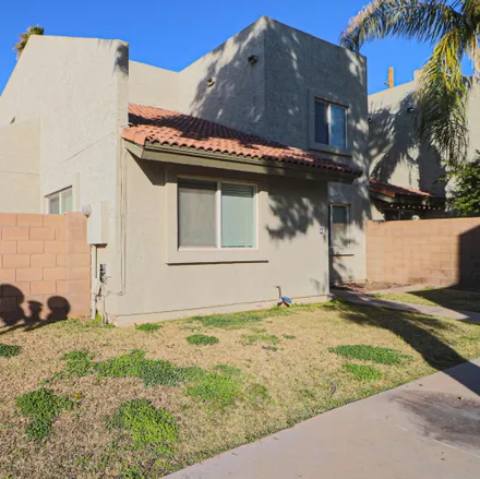 Rent this 3 bed townhouse on Genesis - Mesa Christian Health & Rehab Center in 255 West Brown Road, Mesa