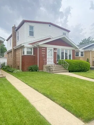 Buy this 5 bed house on 3725 W 66th Pl in Chicago, Illinois