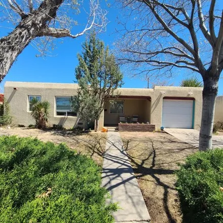 Buy this 4 bed house on 402 Marquette Avenue Northeast in Albuquerque, NM 87108
