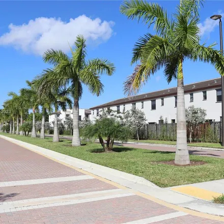 Rent this 3 bed apartment on 21000 San Simeon Way in West Park, FL 33179
