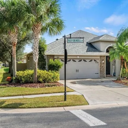 Buy this 4 bed house on 20306 Falling Rock Drive in Land O' Lakes, FL 34638