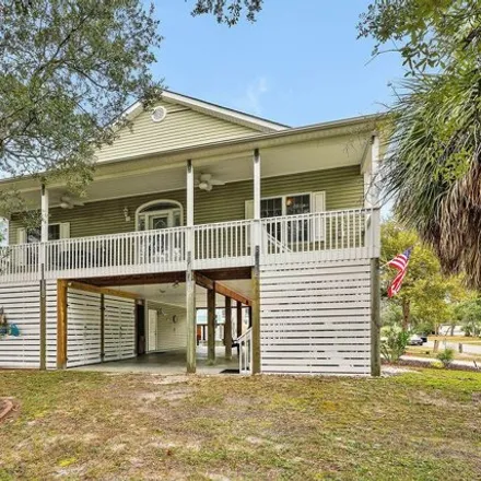 Buy this 3 bed house on 7072 East Oak Island Drive in Oak Island, Brunswick County