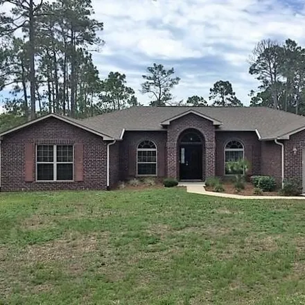 Rent this 4 bed house on Sand Pine Drive in Santa Rosa County, FL 32566