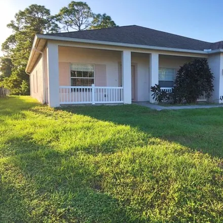 Rent this 4 bed house on 423 Eldron Boulevard Southeast in Palm Bay, FL 32909