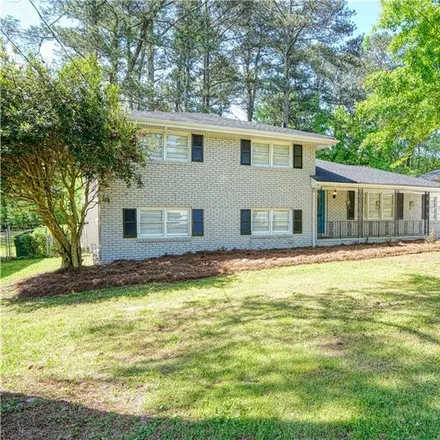 Buy this 4 bed house on 3001 Weslock Circle in Panthersville, GA 30034