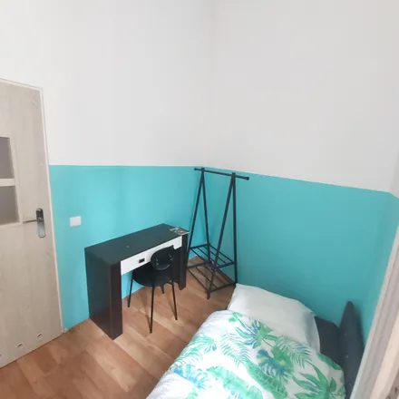 Rent this 4 bed room on Juliana Dunajewskiego 1 in 31-133 Krakow, Poland