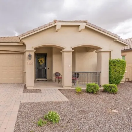 Buy this 4 bed house on 1434 West Buckwheat Tree Avenue in San Tan Valley, AZ 85140