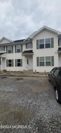 Rent this 4 bed townhouse on 423 Wheaton Avenue in Berkeley Township, NJ 08721