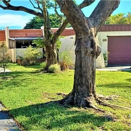 Rent this 2 bed townhouse on 9734 Northwest 65th Street in Tamarac, FL 33321