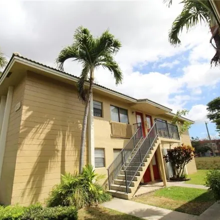 Buy this 2 bed condo on Riverside Drive in Coral Springs, FL 33065