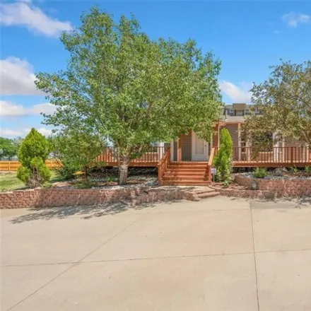 Buy this 4 bed house on 21446 East 11th Avenue in Aurora, CO 80018