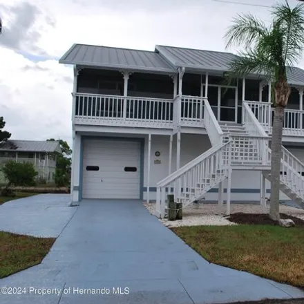 Buy this 4 bed house on 6462 Driftwood Drive in Hudson, FL 34667