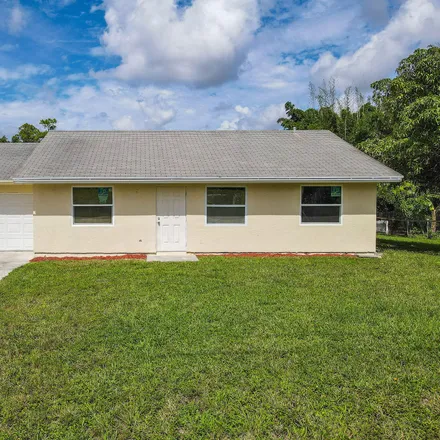Buy this 3 bed house on 15347 San Diego Drive in Loxahatchee Groves, FL 33470