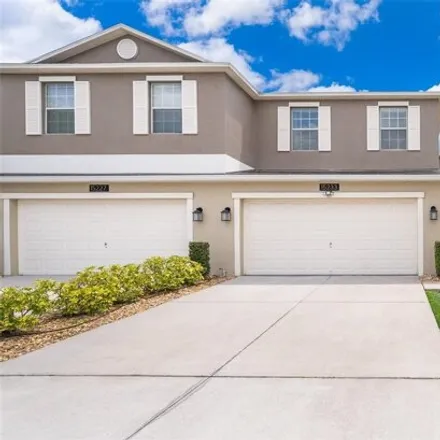 Buy this 3 bed townhouse on 15217 Pacey Cove Drive in Meadow Woods, Orange County